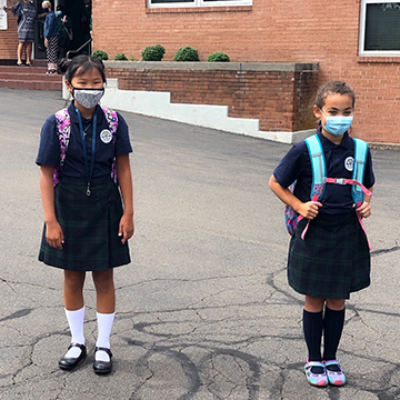 Two St. Rita students wearing face masks for safe learning during Pandemic