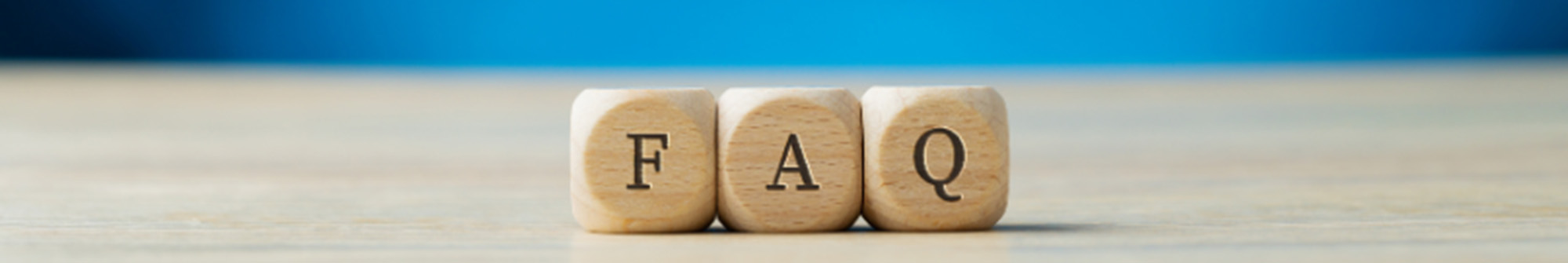 Wooden blocks spelling FAQ